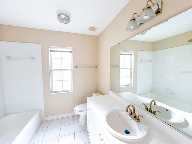 8305 SW 16th Pl, Gainesville, FL 32607 - full bath with vanity, toilet, tile patterned flooring, and shower / bathtub combination