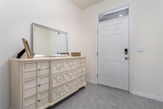 interior space with light tile patterned floors