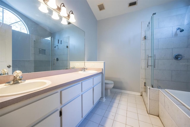 full bathroom with tile patterned floors, vanity, separate shower and tub, and toilet