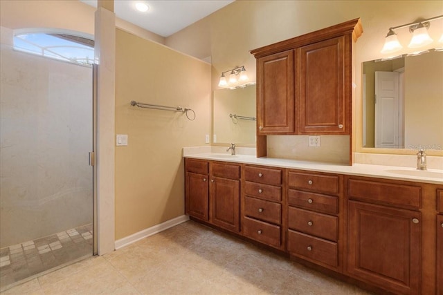 bathroom with vanity and a shower