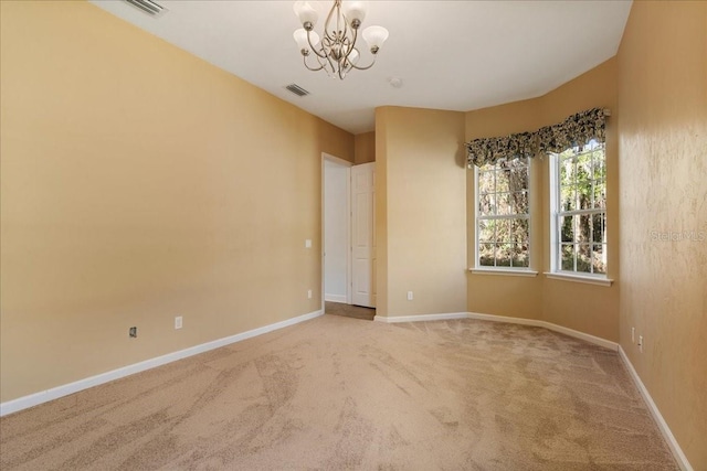 13554 NW 7th Rd, Newberry, FL 32669 - spare room featuring carpet flooring and a chandelier