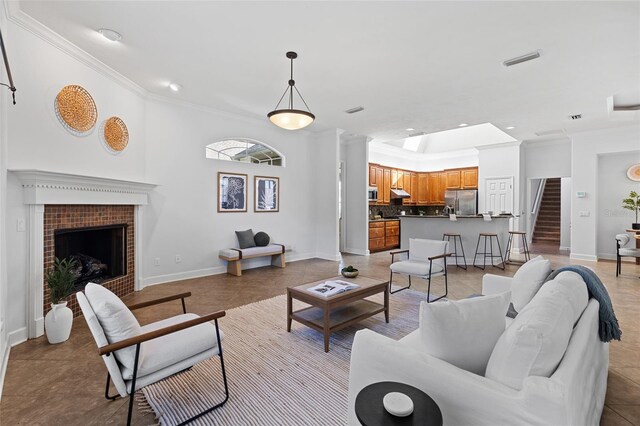 13554 NW 7th Rd, Newberry, FL 32669 - living room with ornamental molding, recessed lighting, stairway, and a fireplace