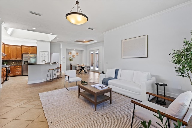 13554 NW 7th Rd, Newberry, FL 32669 - living room with light tile patterned flooring, ornamental molding, and recessed lighting