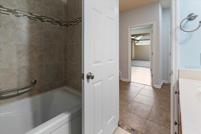13554 NW 7th Rd, Newberry, FL 32669 - full bathroom with vanity, tile patterned flooring, and shower / washtub combination