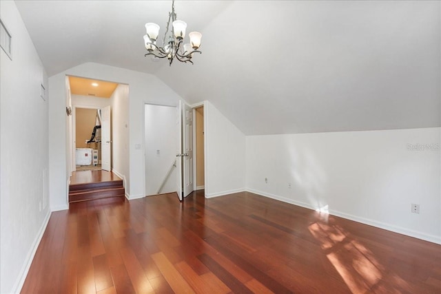 13554 NW 7th Rd, Newberry, FL 32669 - bonus room featuring lofted ceiling, a chandelier, and wood finished floors