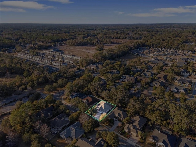 13554 NW 7th Rd, Newberry, FL 32669 - aerial view of property and surrounding area featuring property parcel outlined and nearby suburban area
