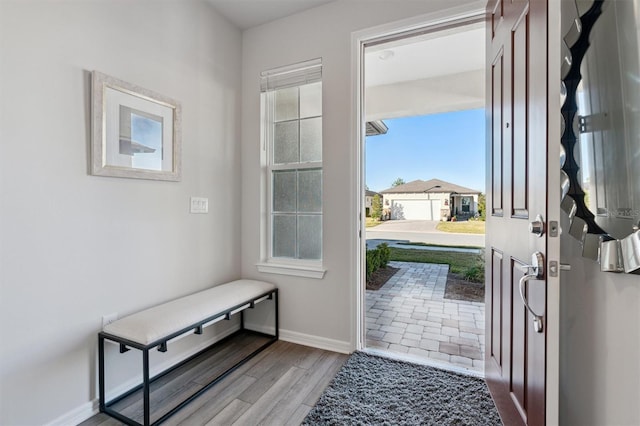 doorway with light hardwood / wood-style floors