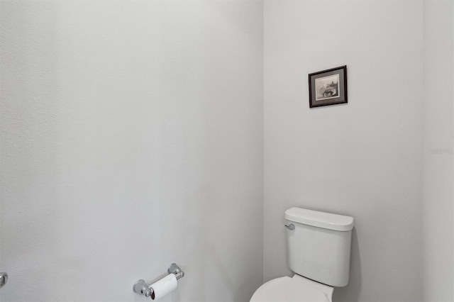 bathroom featuring toilet