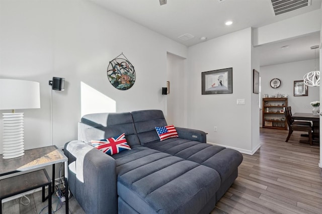 living room with hardwood / wood-style flooring