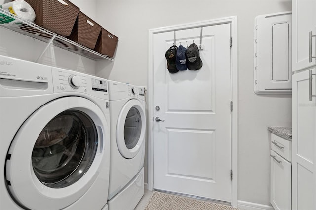 laundry area with washing machine and dryer