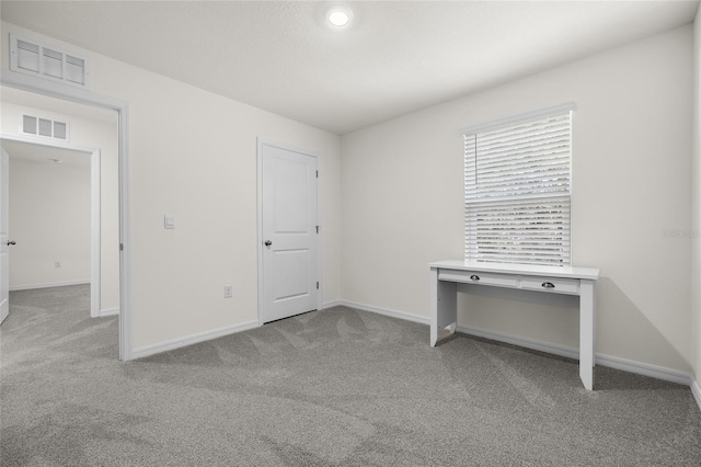 unfurnished bedroom with carpet