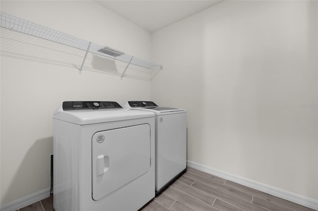 laundry area with washer and clothes dryer