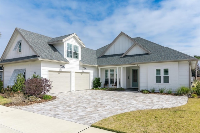 view of front of property with a garage