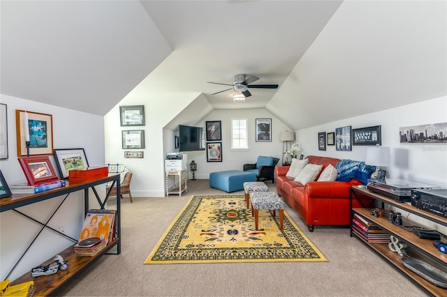 carpeted living room with lofted ceiling and ceiling fan