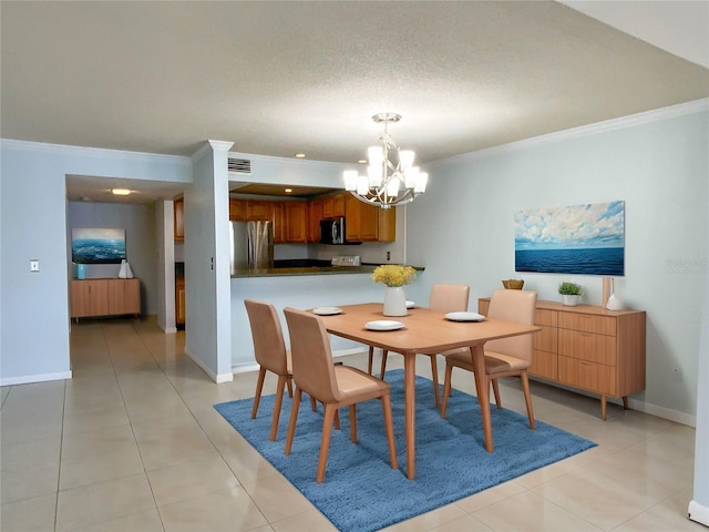 tiled dining room featuring crown molding and a chandelier