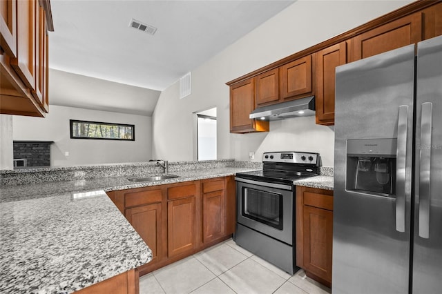 kitchen featuring visible vents, light stone countertops, stainless steel appliances, under cabinet range hood, and a sink