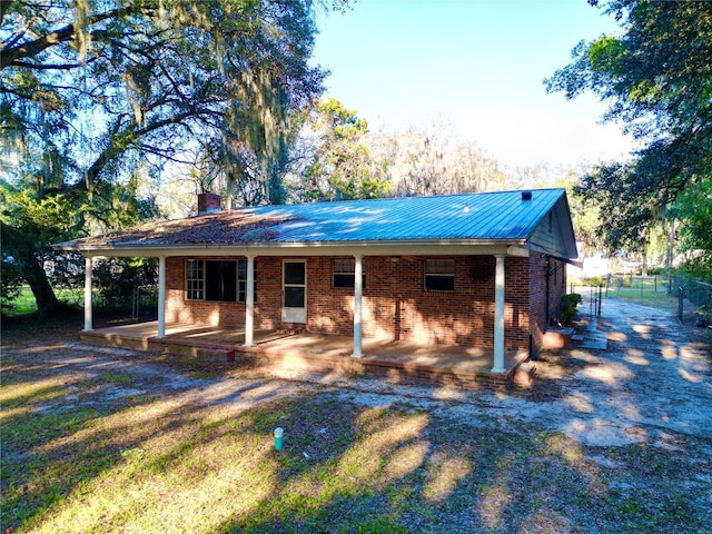 view of front of home featuring a patio