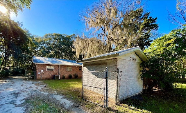 view of outbuilding featuring central AC