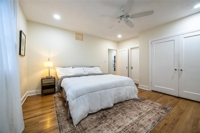 bedroom featuring ceiling fan and hardwood / wood-style floors