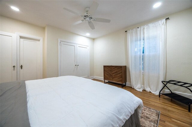 bedroom featuring ceiling fan and hardwood / wood-style flooring