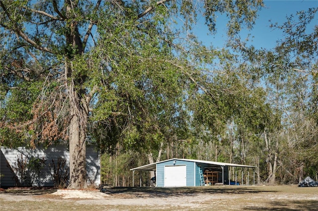 view of outdoor structure with a carport