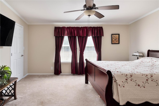 bedroom featuring ceiling fan, light colored carpet, and ornamental molding