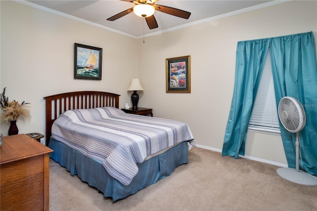 bedroom featuring ceiling fan, light colored carpet, and ornamental molding