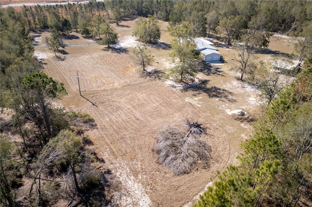 birds eye view of property featuring a rural view