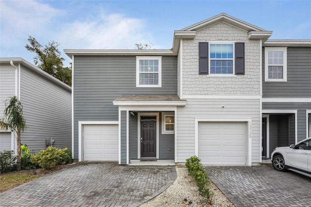 view of front of home with a garage