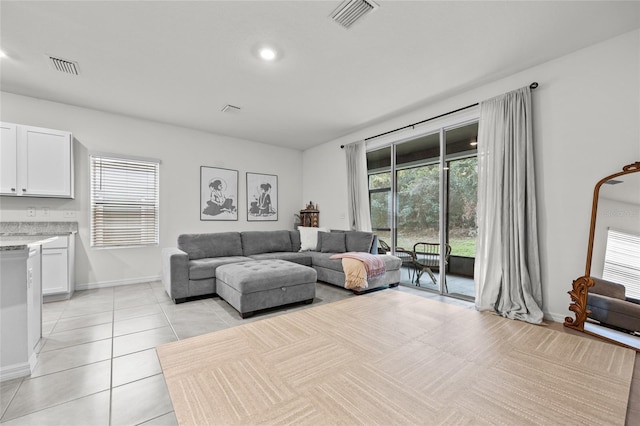 living room featuring light tile patterned floors