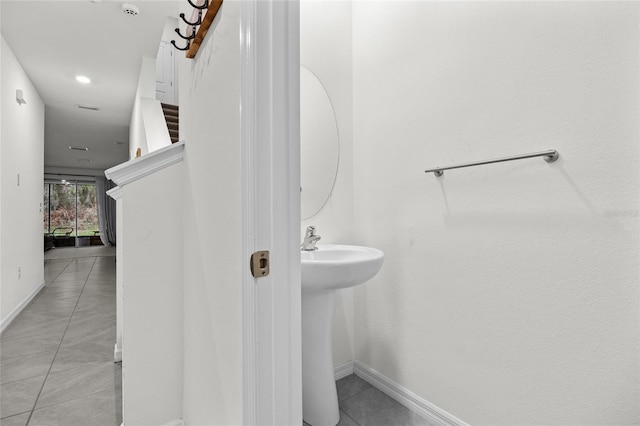 bathroom featuring tile patterned floors and sink