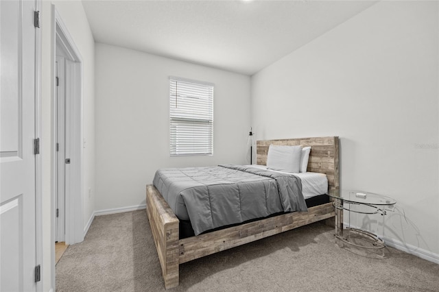 bedroom with light carpet