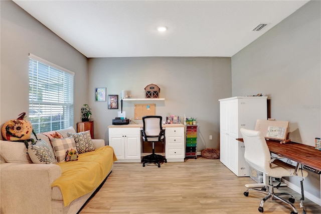 home office featuring light hardwood / wood-style flooring