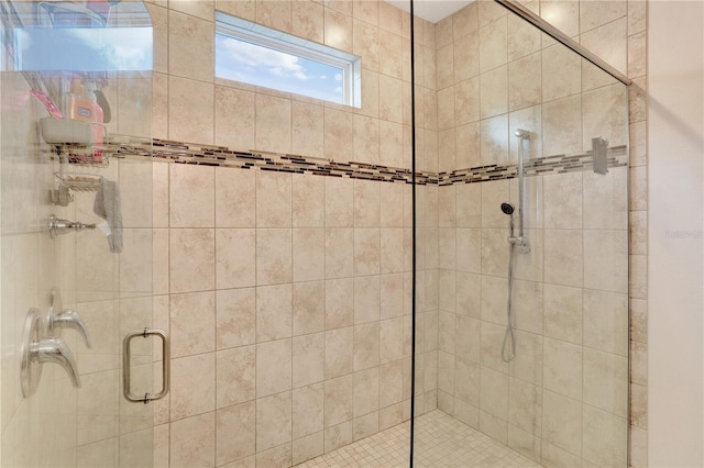 bathroom featuring an enclosed shower