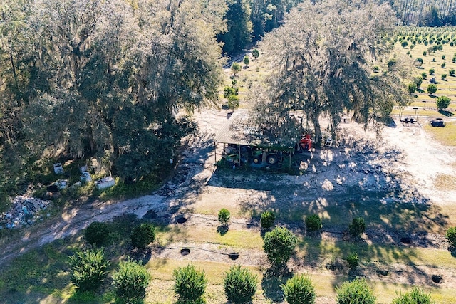 birds eye view of property featuring a rural view