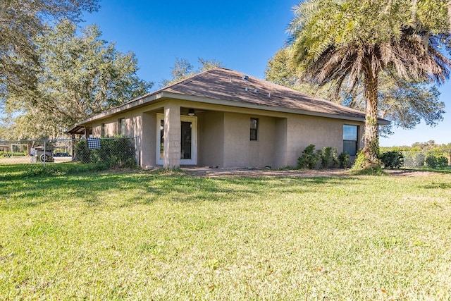 view of home's exterior featuring a yard