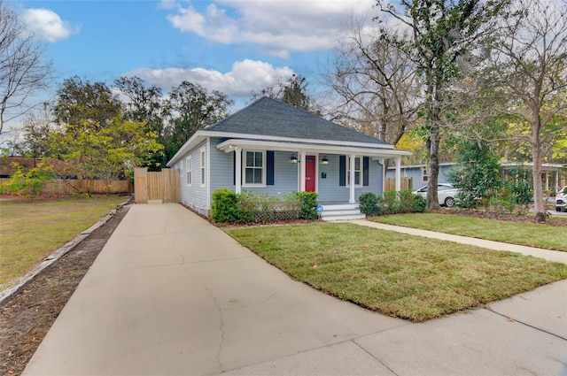 bungalow-style home with a porch and a front lawn