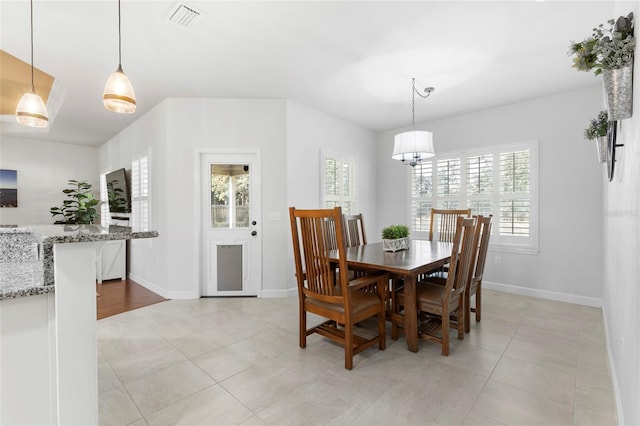 dining room featuring light tile patterned floors