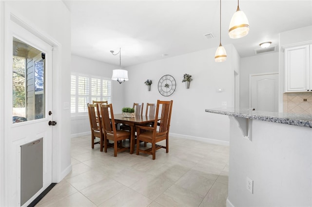 view of tiled dining space