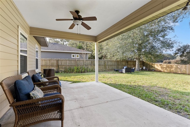 view of patio with outdoor lounge area and ceiling fan