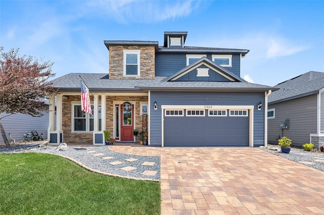 view of front of house with a garage