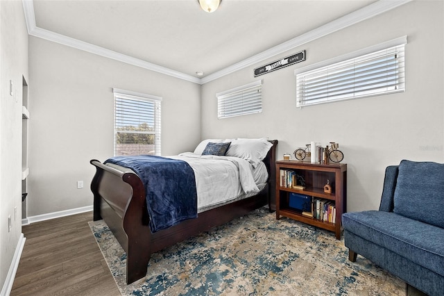 bedroom with crown molding and dark wood-type flooring