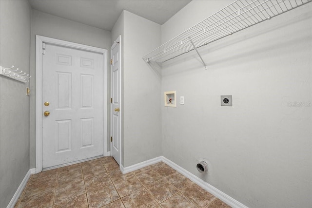 laundry area featuring tile patterned floors, washer hookup, and hookup for an electric dryer