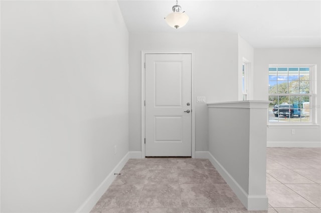 interior space featuring light tile patterned flooring