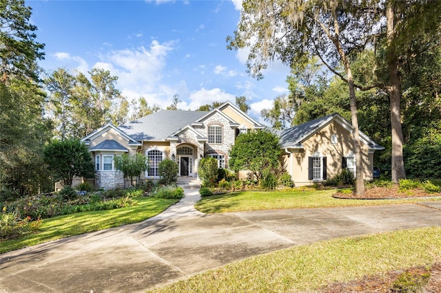 view of front of home with a front yard