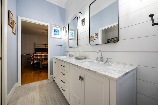 bathroom featuring hardwood / wood-style floors and vanity