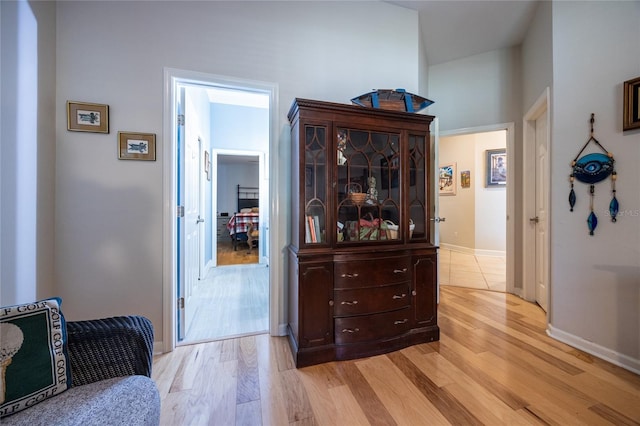 hallway with light wood-type flooring