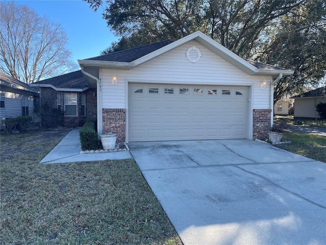 single story home with a garage