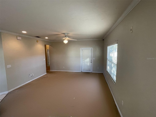 unfurnished room featuring ceiling fan and ornamental molding