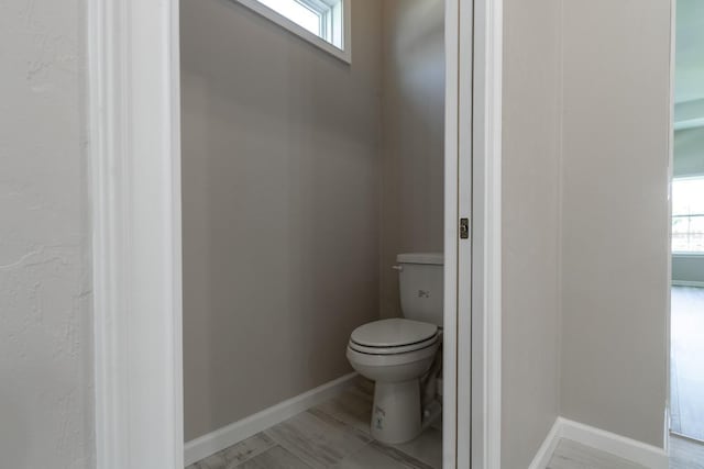 11828 NW 15th Rd, Gainesville, FL 32606 - bathroom with toilet and baseboards